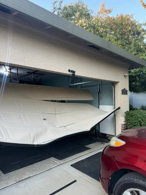 Bent garage door section on a customer job