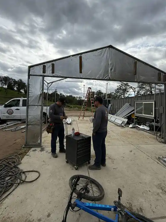 Crew working a door on site